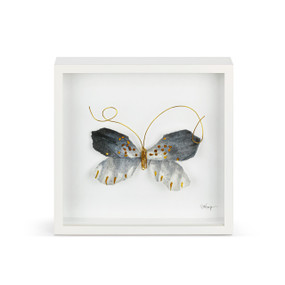 A black and gold butterfly with gold wire tentacles in a white square framed wall art.