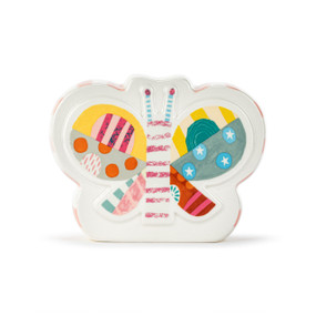 A white ceramic butterfly shaped bank with a colorful patterned butterfly image on the front.