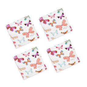A set of four small white cocktail fabric napkins with many small colorful butterflies on them.