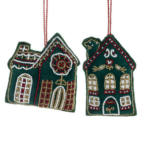 Two dark green home shaped ornaments decorated with beads.