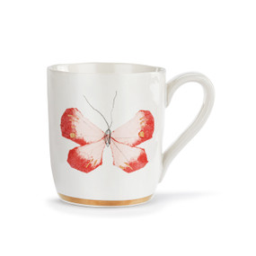 A white ceramic mug with a coral art butterfly and a gold trim around the base.