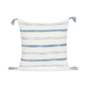 A square white pillow with blue stripes and tassels on the corners.