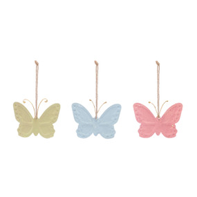 A set of three paper mache butterfly ornaments in green, blue and pink.