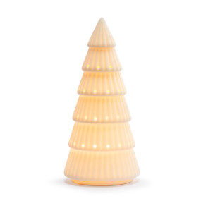 An evergreen tree shaped white ceramic figure that lights up, displayed lit.