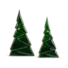 Two different sized wood carved trees with green enamal paint on the front.