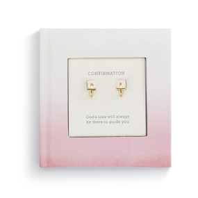 A small square pink inspirational confirmation book with a pair of gold cross earrings inside.