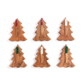 A set of six mini wood serving boards shaped like trees. Each has a wood spreader and different holiday words at the bottom.