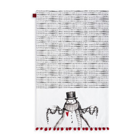 A gray and white kitchen towel with an illustrated snowman at the bottom displayed laid out flat.
