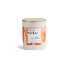 A 3.5 oz citrus sunshine scented candle in a round white container with a gold lid.