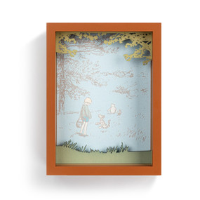 A brown shadow box frame with a classic image of Winnie the Pooh, Tigger and Christopher Robin.