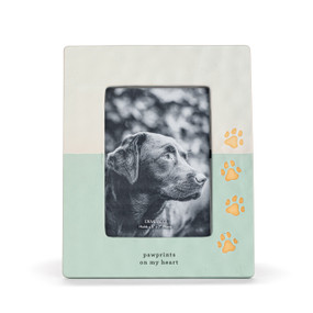 A 5x7 cream and green ceramic frame with paw prints up one side and the saying "pawprints on my heart" at the bottom.