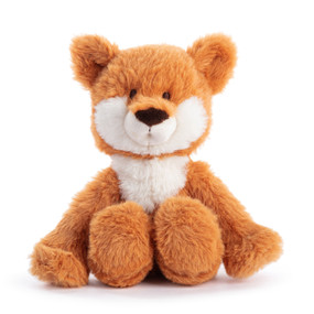 A small plush orange and white fox displayed sitting.