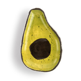 A small avocado shaped ceramic plate painted on the inside to look like the inside of an avocado.