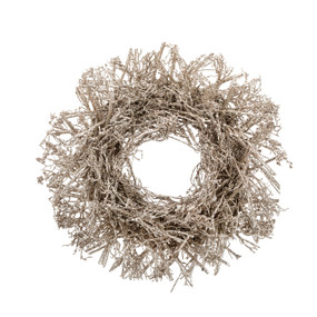 A large wreath made of twigs painted gold.