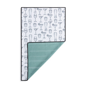 A rectangular double sided towel. One side is white with illustrated cocktails and the other is green with white lines, displayed with the green corner turned back.