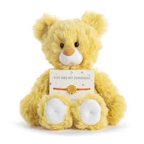 A yellow plush teddy bear with an attached bracelet with a sun charm intended for a child.
