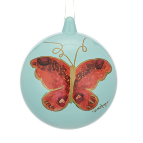 A sage green round ornament with an illustrated red butterfly on each side.