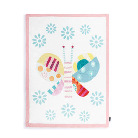 A white blanket with a colorful patterned butterfly in the middle and a pink border.
