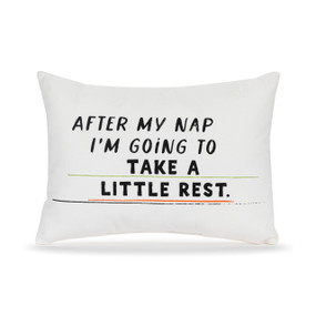 A small white accent pillow with the saying "After my nap I'm going to take a little rest".