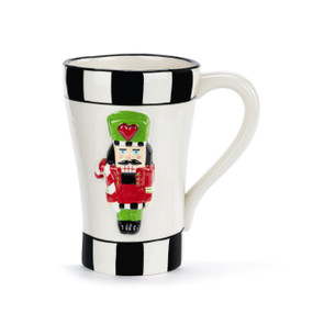 A white ceramic mug with a black check border and a raised red and green nutcracker on the front.
