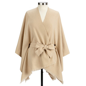 A camel fringed wrap with a tie waist displayed on a mannequin.