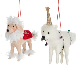 Two white felt dogs including a poodle and a samoyed dressed in a Christmas sweater and holiday lights.