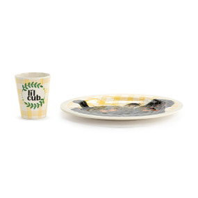 A set that includes a small yellow and white plaid cup with the saying "li'l cub" and a yellow and white plaid plate with the image of a black bear waving its paw.