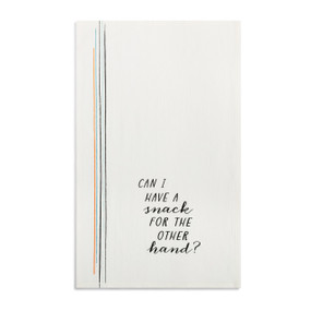 A white kitchen towel with the saying "Can I have a snack for the other hand?" displayed laid out flat.
