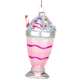 A pink and purple milkshake ornament decorated with a straw and toppings.