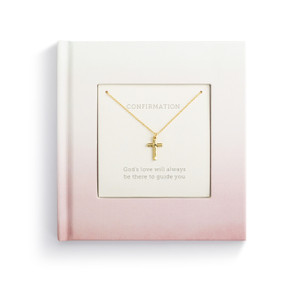 A small square pink inspirational confirmation book with a gold cross necklace inside.