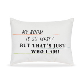 A small white accent pillow with the saying "My Room is so Messy but that's Just Who I Am!".