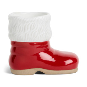 A scented candle shaped like Santa's red boot with white fur. The scent is chocolate peppermint.