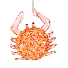 A hanging ornament of an orange crab with decorative beads on top.