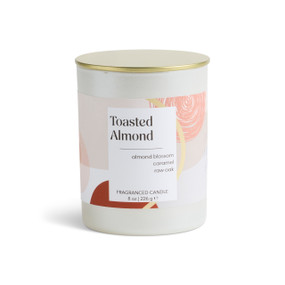 An 8 oz toasted almond scented candle in a round white container with a gold lid.