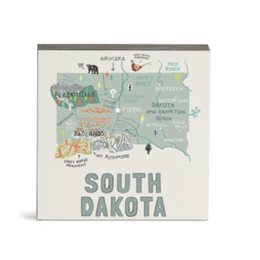 A white square wall art with an illustrated map of South Dakota with landmarks and cities.