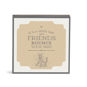 A white and brown wall art with Tigger and the saying "It's a Good Day when Friends Bounce Your Way".