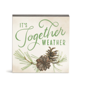 An illustrated square wall art of winter pines and the saying "It's together weather".