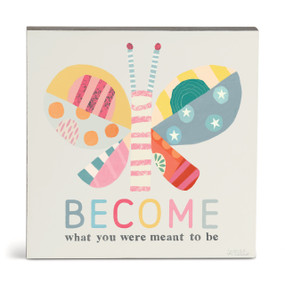 A wall art of a pastel colorful butterfly and the saying "Become what you were meant to be".
