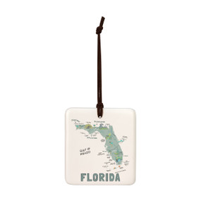 A square cream hanging tile magnet ornament with a map illustration of Florida with landmarks and cities.