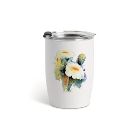 A white tumbler with a clear plastic lid and a watercolor image of a flowering white Saguaro Cactus flower on the front.
