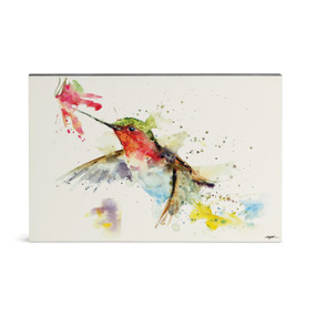 A watercolor wall art of a hummingbird at a flower.
