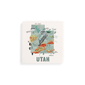 A set of four white square coasters with a map illustration of Utah with famous landmarks and cities.