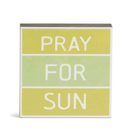 A light yellow and green wall art with the saying "Pray For Sun" in white text.