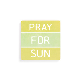 A set of four square yellow and green coasters with the saying "Pray for sun" in white text.