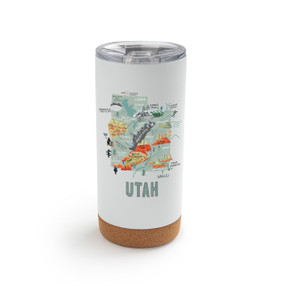 A white cork bottom tumbler with a graphic map image of Utah and illustrations of famous locations and cities.