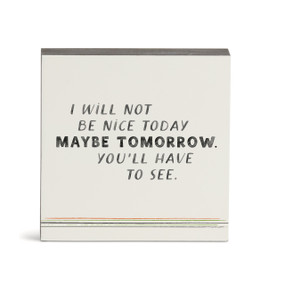 A white wall art with the saying "I will not be nice today maybe tomorrow. You'll have to see."