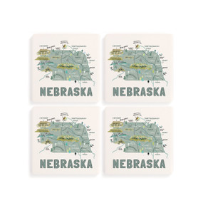 A set of four white square coasters with a map illustration of Nebraska with famous landmarks and cities.