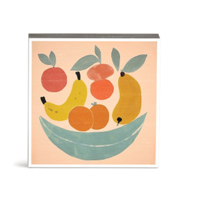 An illustrated wall art of different fruit in a bowl against a peach background.