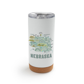 A white cork bottom tumbler with a graphic map image of Nebraska and illustrations of famous locations and cities.