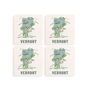 A set of four white square coasters with a map illustration of Vermont with famous landmarks and cities.